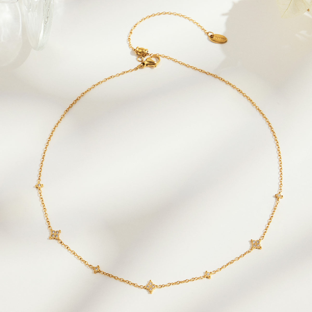 Stainless steel zircon station necklace with gold PVD chain
