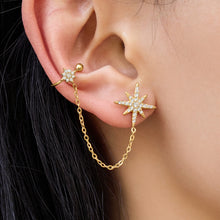 Star zircon ear clip shining in gold