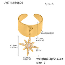 Elegant gold star zircon ring on display