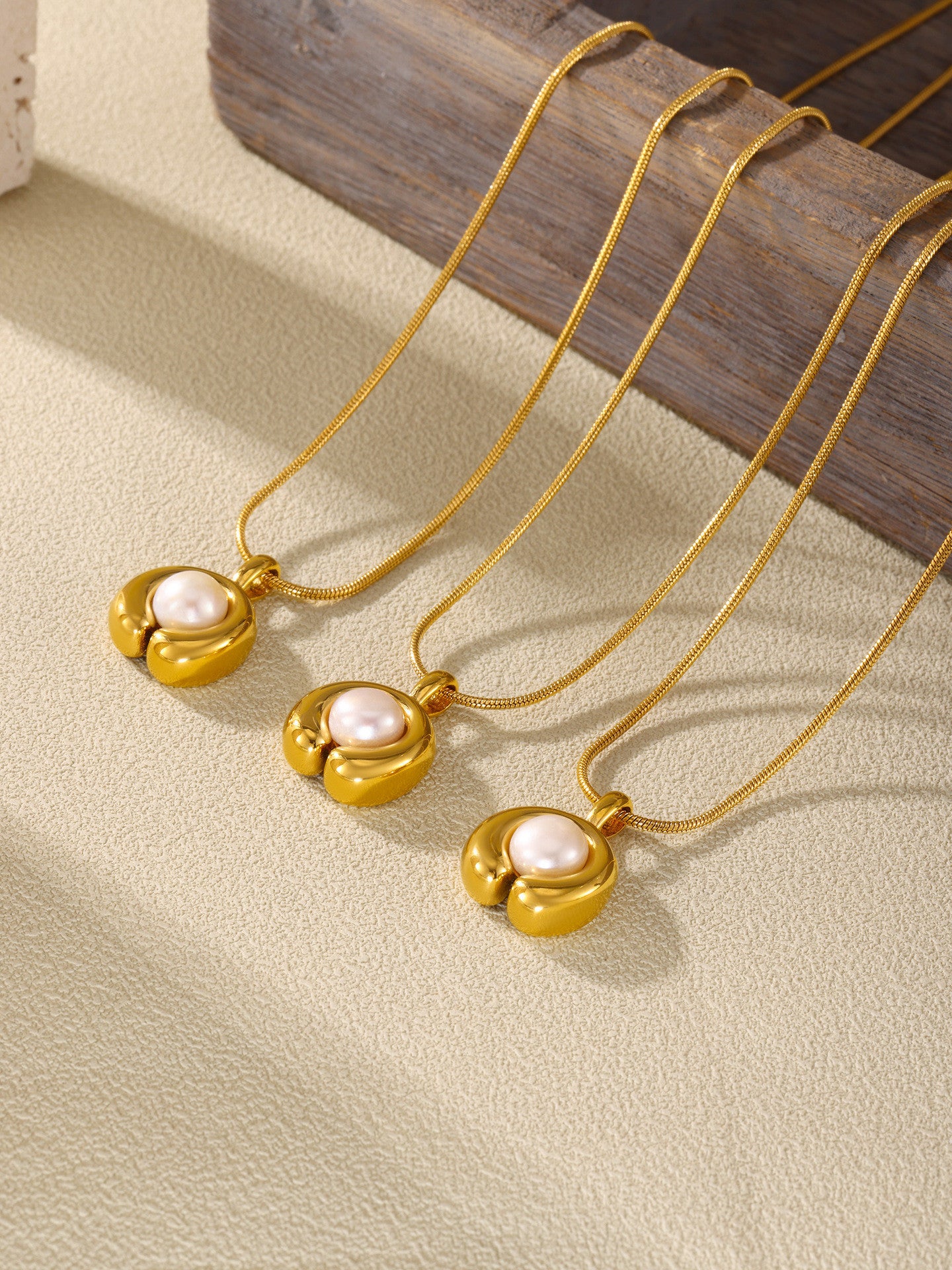 316L Stainless Steel 18K Gold PVD Plated C-shape Freshwater Pearl Necklace - sophisticated side angle
