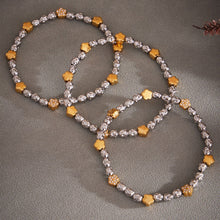 316L Stainless Steel 18K Gold PVD Plated Floral Stretch Bracelet - luxury texture close up