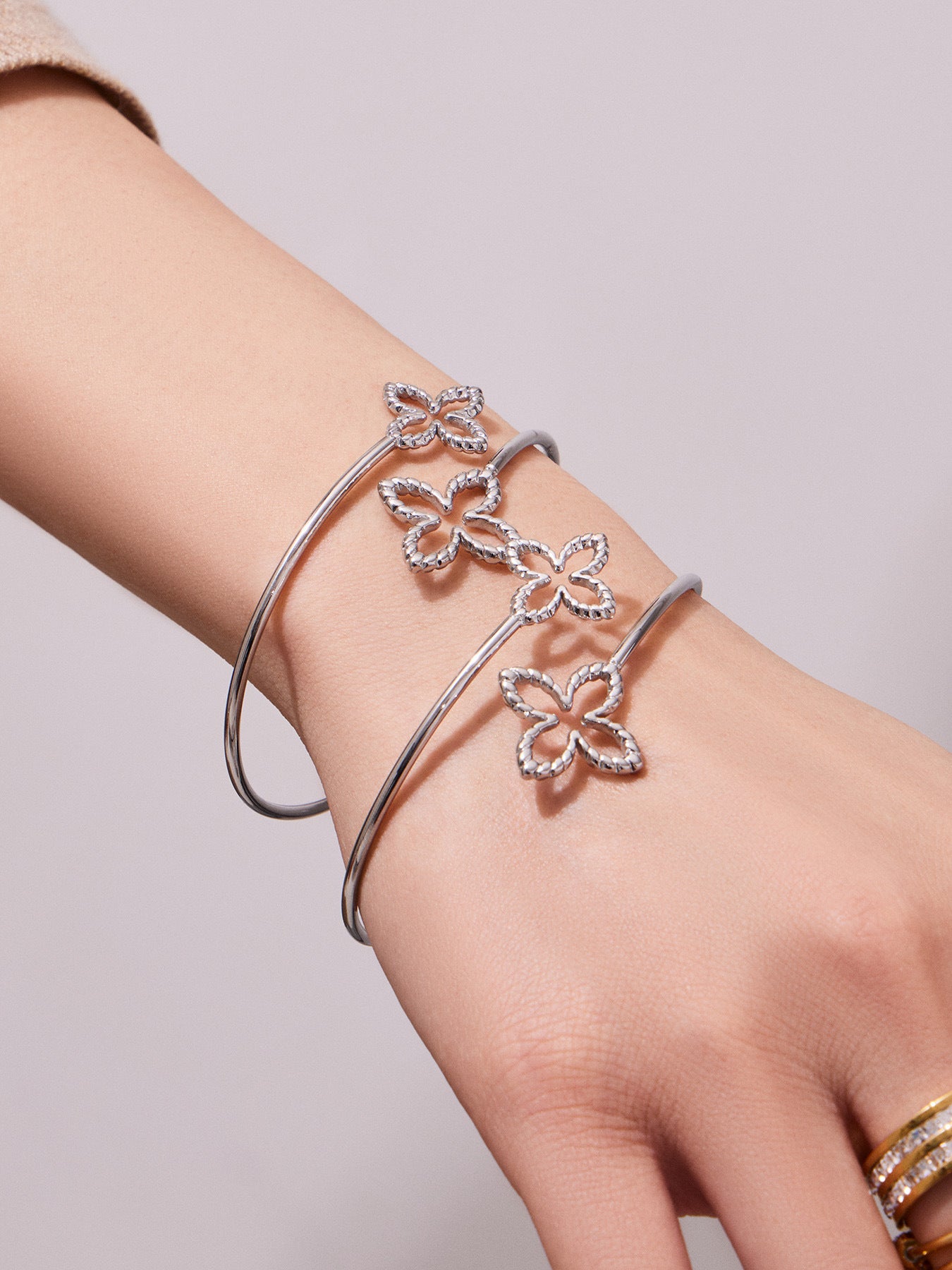 316L Stainless Steel 18K Gold PVD Minimalist Floral Open Bangle - sophisticated side angle