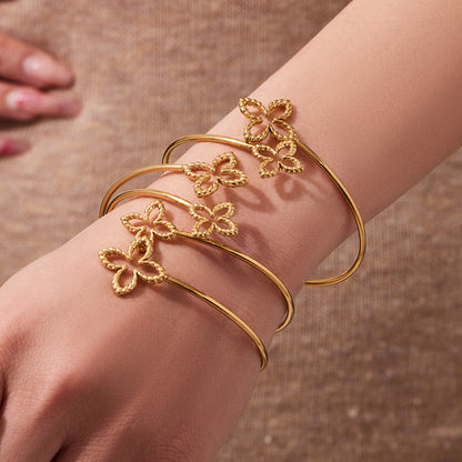 316L Stainless Steel 18K Gold PVD Minimalist Floral Open Bangle - sophisticated side angle