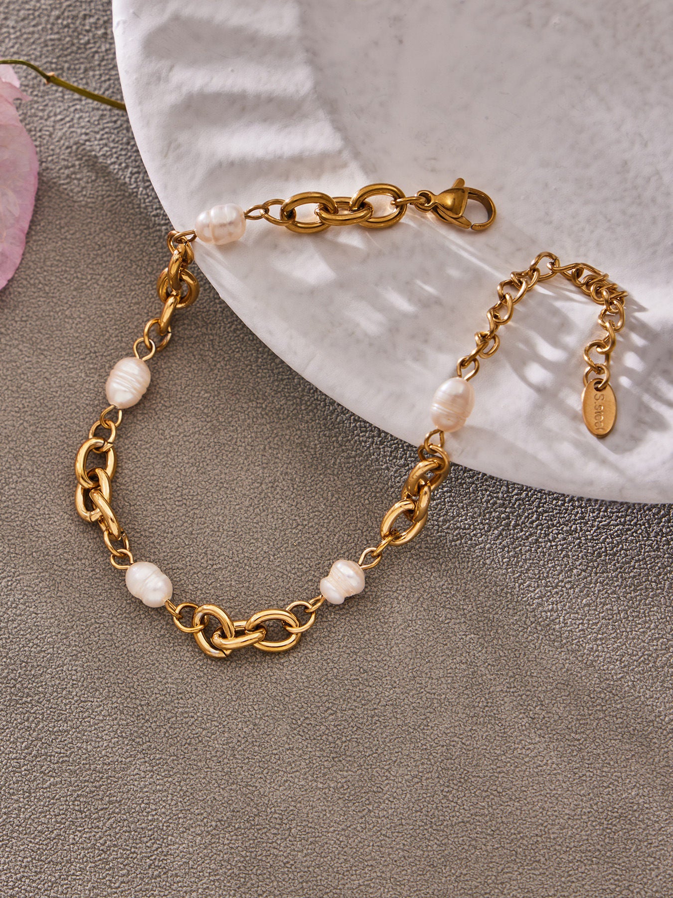 Back view of 316L stainless steel 18K gold PVD zircon bear bracelet, secure lobster clasp closure