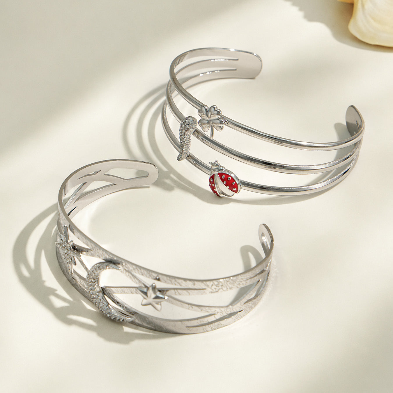 Polished steel celestial star moon and chili pepper cuff bracelet design options