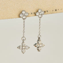 Steel-tone four-leaf clover drop earrings with clear cubic zirconia