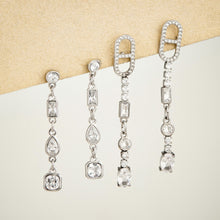 Steel-tone cubic zirconia long drop earrings in multiple geometric styles