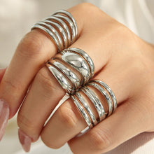 Model wearing steel tone 316L stainless steel multi-band open rings