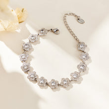 Steel-tone stainless steel flower link bracelet with cubic zirconia accents