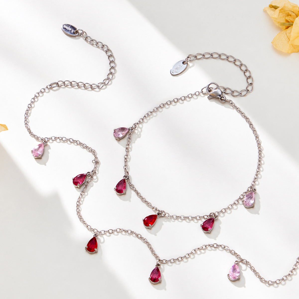 Steel-tone chain jewelry with colored teardrop zircon charms