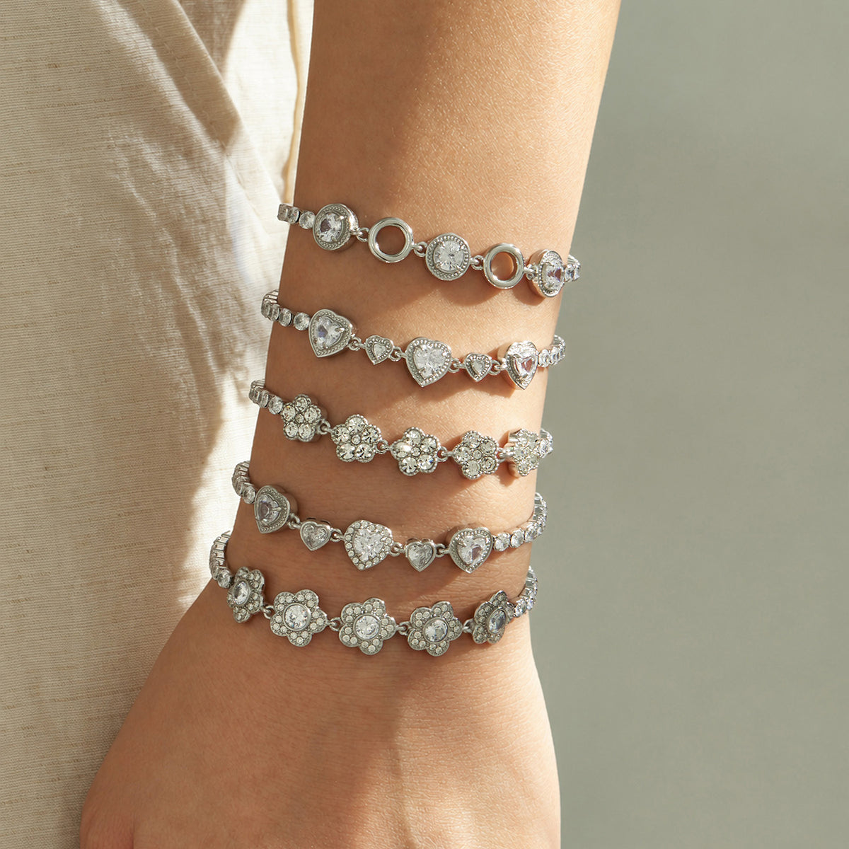 Steel zircon bracelets stacked on wrist