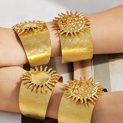 Hammered gold sun bangle
