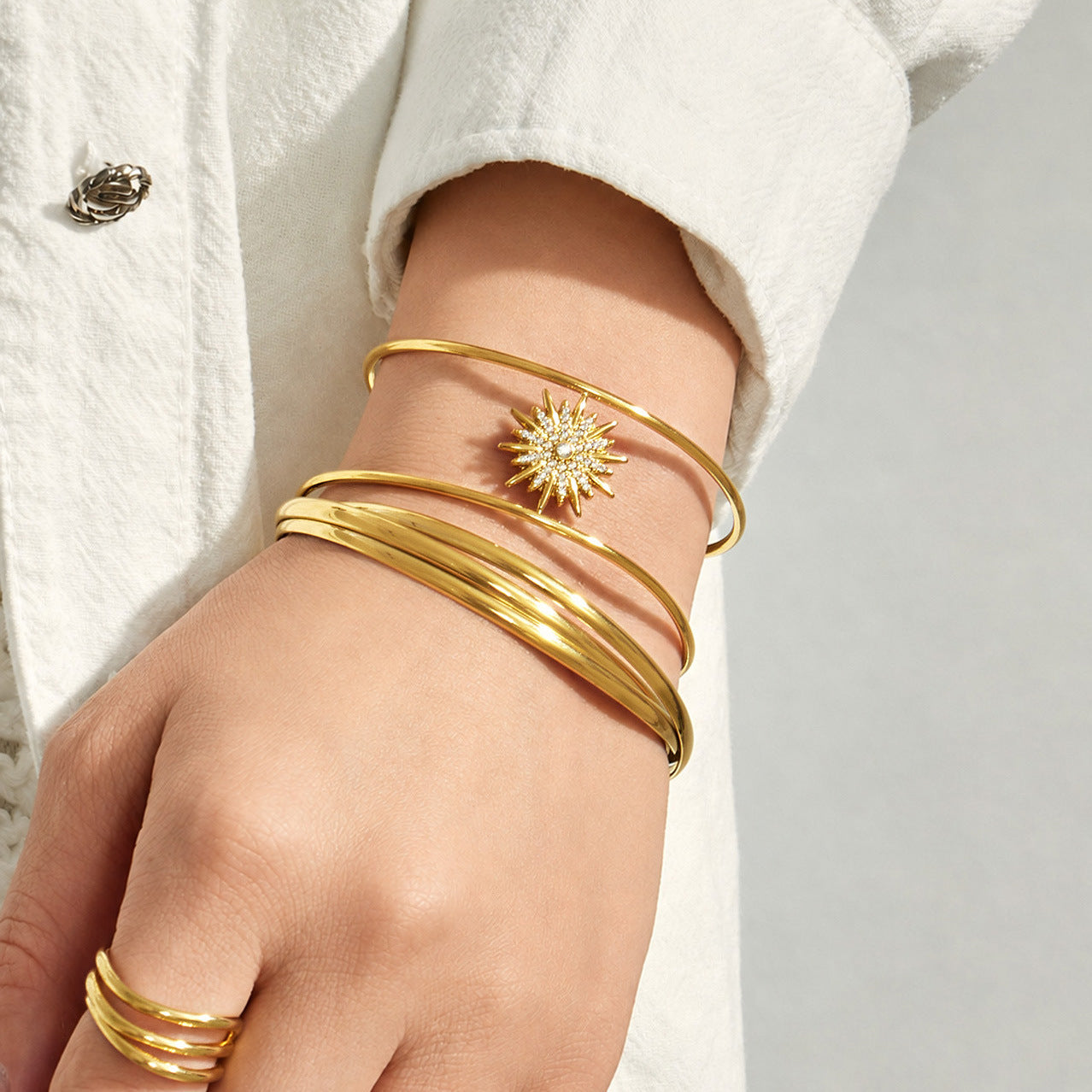 316L Stainless Steel 18K PVD Gold Sun Zircon Open Bangle made with 316L stainless steel and 18K PVD gold finish for wholesale jewelry buyers - image 7
