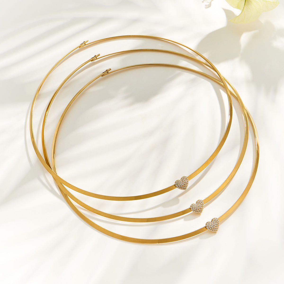 Close-up of the 18K PVD gold finished tassel necklace