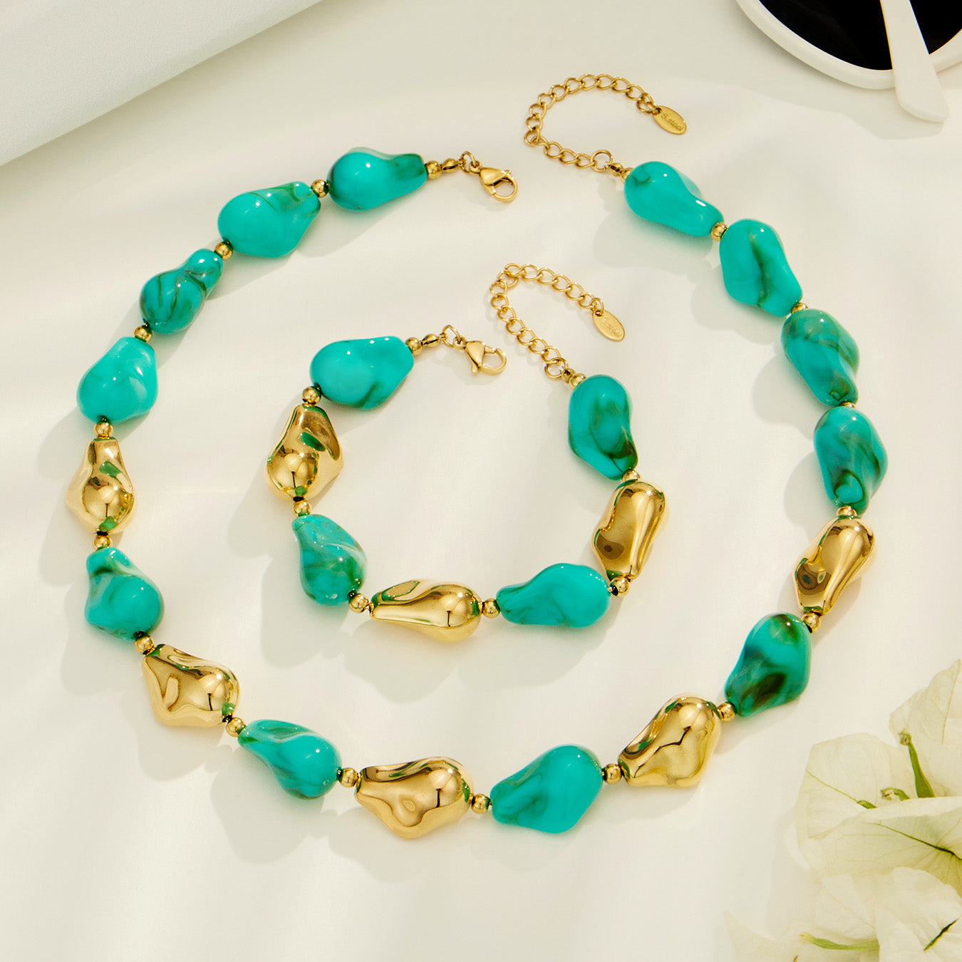 Turquoise green resin necklace and matching bracelet set with organic statement beads