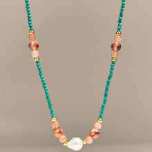 Turquoise natural stone necklace with freshwater pearls and gold-tone details