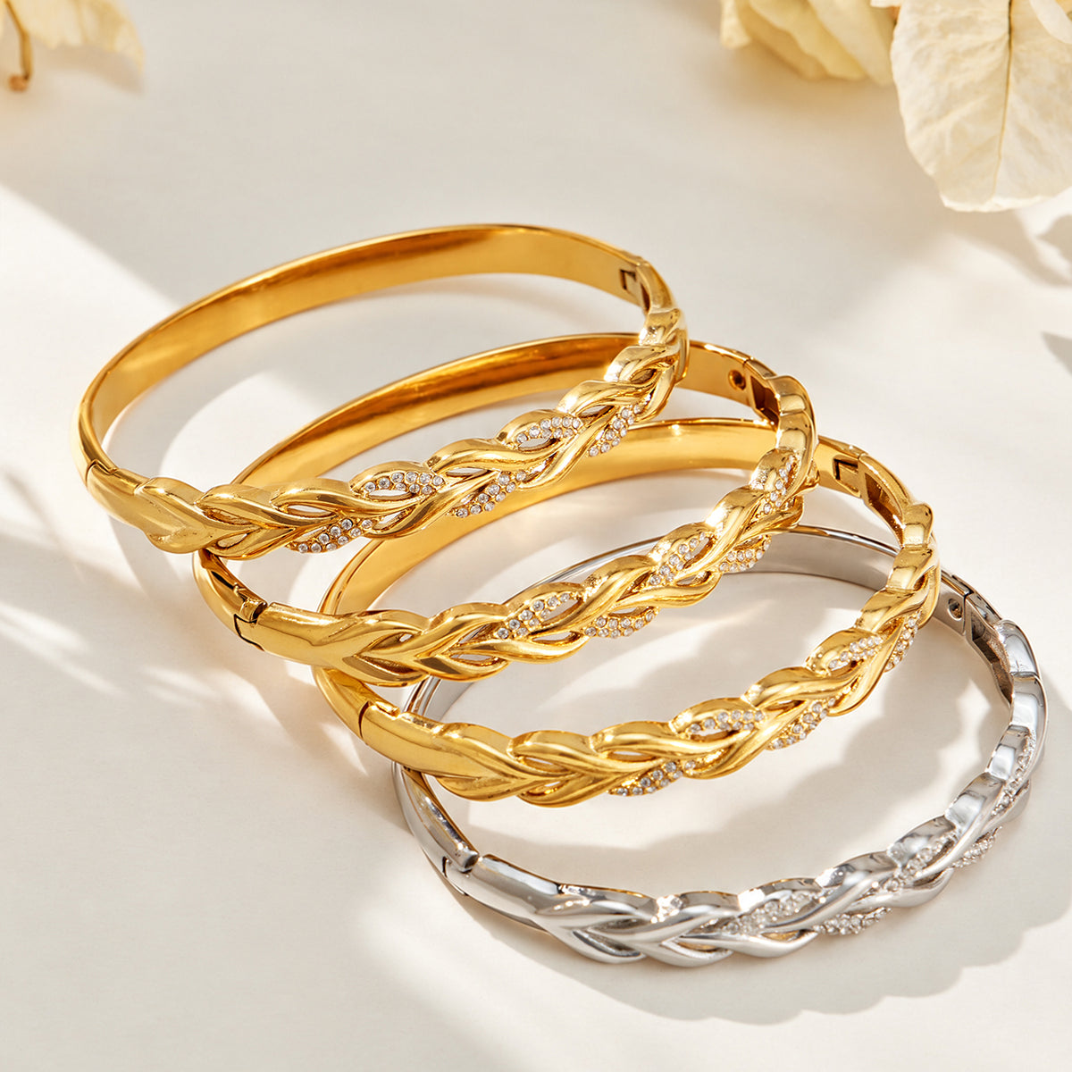 Twist rope design bangle with zircon stones