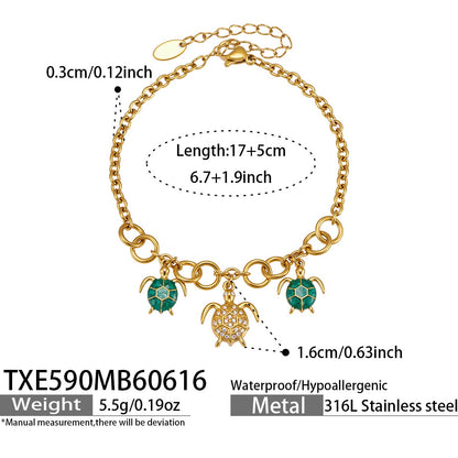 TXE590 gold turtle ocean charm bracelet size card showing 17 plus 5cm length and marine-inspired pendant design