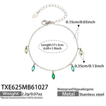 Size diagram for a steel-tone bracelet with green pointed teardrop charms, showing the 17 cm chain and 5 cm extender.