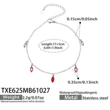 Size diagram for a steel-tone bracelet with red pointed teardrop charms, showing the 17 cm chain and 5 cm extender.