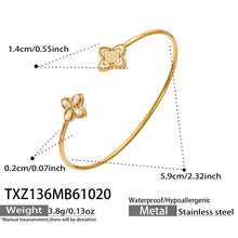 TXZ136 gold-tone floral open bangle size guide showing approximately 5.9 cm across and 3.8 g weight