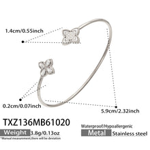 TXZ136 steel-tone floral open bangle size guide showing approximately 5.9 cm across and 3.8 g weight