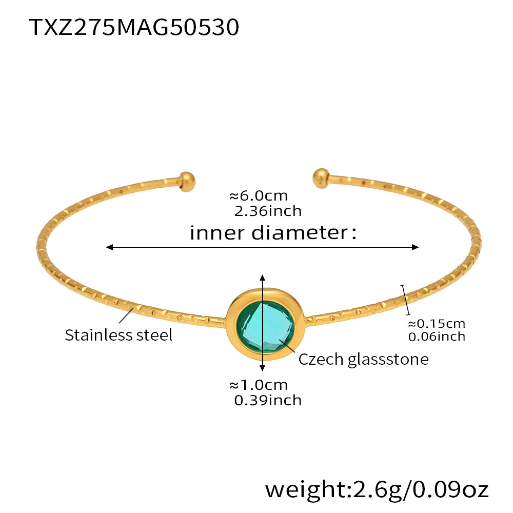 stainless steel open bangle, 18K gold plated, 6.0cm inner diameter, 1.0cm aqua round faceted Czech glass stone, weight 2.6g