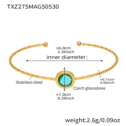 stainless steel open bangle, 18K gold plated, 6.0cm inner diameter, 1.0cm aqua round faceted Czech glass stone, weight 2.6g