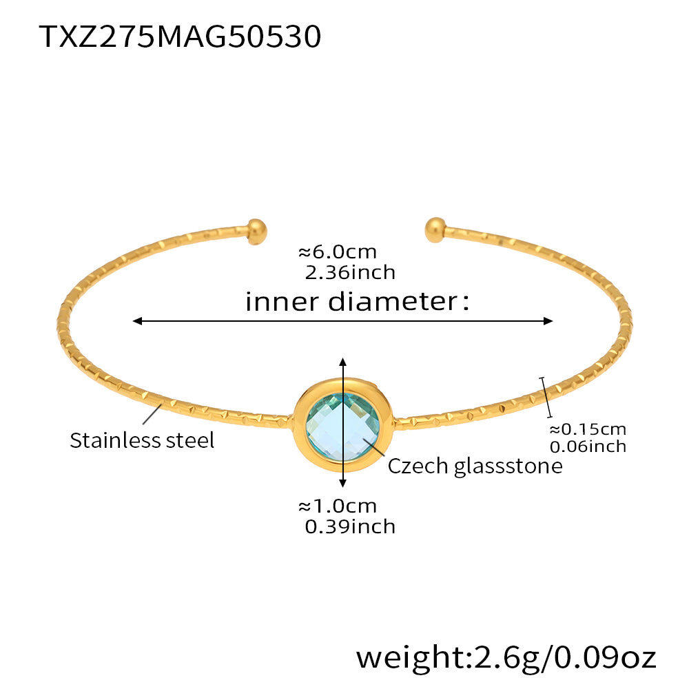 stainless steel open bangle, 18K gold plated, 6.0cm inner diameter, 1.0cm blue round faceted Czech glass stone, weight 2.6g