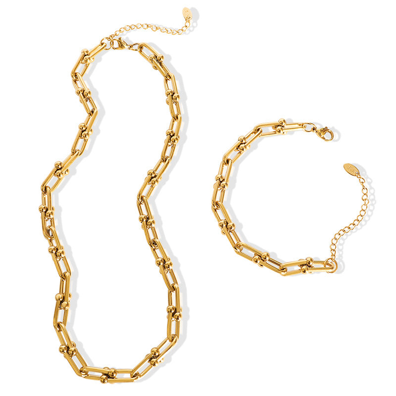 Gold U-link chain necklace and bracelet with elongated geometric links
