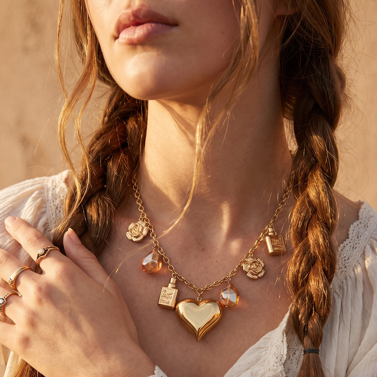 Vintage-inspired gold heart charm necklace with hanging decorative charms