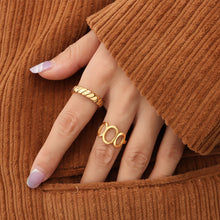 Waterproof gold ring with 18K PVD finish shown in everyday wearing style