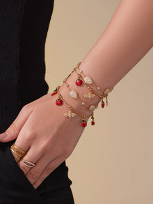 Model wearing waterproof zircon waterdrop charm bracelet, 316L stainless steel jewelry for everyday wear