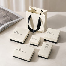 White and black jewelry boxes with matching gift bag for wholesale jewelry packaging