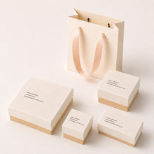 White and pink jewelry boxes in multiple sizes with matching ribbon gift bag for wholesale jewelry packaging