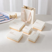 White and blush pink jewelry packaging boxes in multiple sizes for rings earrings bracelets and necklaces