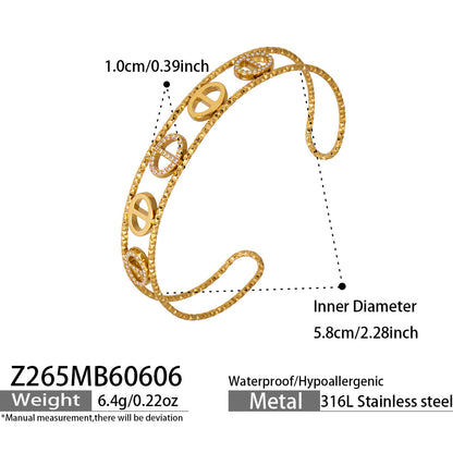 Z267 gold zircon bangle size card showing 5A zircon detail and 316L stainless steel material