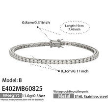 Close-up of pink zircon detail on chain bracelet