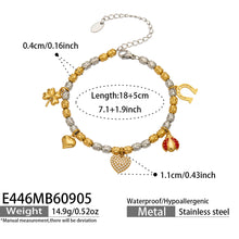 E446 gold multi charm bracelet size guide with 18 cm bracelet and extension chain