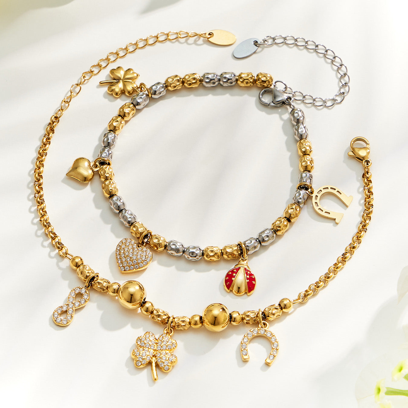 E446 steel multi charm bracelet size guide with 18 cm bracelet and extension chain