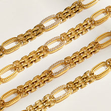 Close-up of stainless steel watch band chain links with zircon-set oval accents